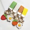 Porte-clés porte-clés en cuir fraises oranges oeuf poché pendentif créatif porte-clés en métal petits sacs femmes hommes ornement personnalisé