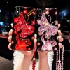 Étuis de téléphone portable Luxe Glitter Diamond Butterfly Glisten Phone Case pour iPhone 14 13 12 11 Pro Max X XS XR 7 8 Plus SE Crystal Chain Bling Cover L230731