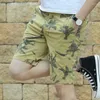 Pantaloncini da uomo 2023 Summer Male Camouflage Pantaloni da spiaggia casual a cinque quarti Versione coreana di tendenza elastica