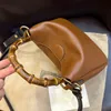 10A Calidad de espejo Diana Bolso de hombro pequeño Diseñador Bolso de bambú 24 cm Bolsos cruzados Monedero de cuero genuino con caja G041