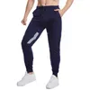 Calças masculinas leggings esportivas de bolso duplo fitness corrida solta cordão roupas masculinas moda casual calças masculinas