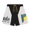 Rhude Sunset Side Print Little Fashion Brand Pantaloncini sportivi in nylon larghi americani Pantaloni da spiaggia estivi Uomo