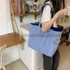 Bolsa de ombro feminina Totes Lona 2023 Bolsa de mão de grife Lazer feminino Sólida Bolsa de compras com fundo plano Bolsa de grande capacidade com dois lados elegantesbolsas de mãoloja