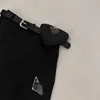 Röcke Designer P Family Triangle Emblem Schwarzes Arbeitskleid Damen A-Linie Kurzer Rock mit Gürteltasche Fashion Spicy Girl Half V6SZ