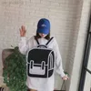 School Bags Children039s Schoolbag ulzzang graffiti blackandwhite dring paper 2D cartoon Men and women backpack For Teenage Girls4138924 Z230802