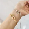 Designer armband guldpläterade damer charmarmband klassiska designarmband icke-blekande och icke-allergiska 2 färger tillgängliga
