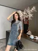 Basic & Casual Dresses designer Spring/Summer New niche design trendy brand metal triangle punctuation embellished with old denim strap skirt VI0A