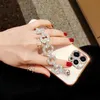 Cell Phone Cases Luxury Lens Protective Glitter Diamond Wrist Chain Soft Phone Case For iPhone 14 13 12 11 Pro Max 7 8 Plus X XR XS SE 2 3 Cover L230731