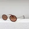 2024 Designer de luxo Sunglasses de novo designer de luxo VA Família da família Fanxiao Round Frame Rivet Os mesmos óculos de sol da moda Trend Va2027