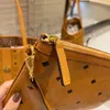 Weekendbakken echte lederen koppelingszakken dubbelzijdige shopper dames luxe ontwerper mannen handtas met grote capaciteit klassieke crossbody bagage pochette schoudertassen