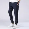 Męskie spodnie moda letnia cienka sekcja męskie spodnie dresowe swobodny sport spodni joggery siłowni spodnie Szybkie suche rozmiar plus