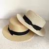 Breda randen hattar Sommar för kvinnor Sun Hat Beach Ladies Boater med Bowknot Casual Straw