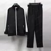 2023 Diseñador de ropa deportiva para hombres Chaqueta con cremallera y pantalones Conjunto Diseñador de mujeres con letras bordadas Ropa deportiva Jogging Pantalones casuales Ropa deportiva