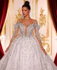 Luxury Ball Gown Wedding Dresses Long Sleeves V Neck Sequins Appliques Diamonds Floor Length Beads Lace-up 3D Lace Crystals Bridal Gowns Dress Vestido de novia