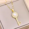 Pendentif Colliers En Douce Lumière De Luxe Perle Pour Les Femmes De Mode Sexy Femelle En Acier Inoxydable Clavicule Chaîne Bijoux En Gros