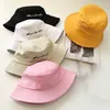 Modehatt kvinnor sommarsolskydd solskade koreanska modestudenter mångsidig broderi hink hatt japansk tunn solhatt