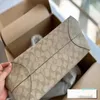 Diseñador -Bolsa de lujo con hebilla de succión Patrón clásico Mochila elegante y duradera de gran capacidad para viajes