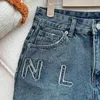 Correcte versie 23 lente nieuwe zijletter hoge taille slanke jeans met rechte pijpen voor dames