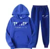 Мужские рубашки T 2023 бренд Trapstar Print Sportswear Мужчины 15 цветов теплые две части, заложенные в толстовку с капюшоном.