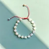 Braccialetti di fascino Stella di conchiglia naturale per le donne Braccialetto di perle d'acqua dolce reale di lusso Fornitore all'ingrosso di gioielli con corde rosse Pulseras