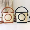 Berömd designer kvinnors väska varumärke mode hink väskor laffia gräs virkning halm axel handväska sommarstrand små väskor kors body hasp handväska väska
