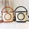 Famous designer women's bag brand fashion bucket bags laffia grass crochet straw shoulder handbag summer beach small bags cross body hasp purse bag