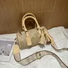 23 Kvinnors väskor Ny handväska Lacey Classic Presbyopic Tassel Decoration Round Bags Shoulder Messenger Pen Holder Bag