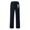 Pantaloni da uomo Uomo Casual Piuma stampata Pantaloni a figura intera Tasca con bottoni Pantaloni con coulisse 2023 Moda Streetwear Pantaloni sportivi da uomo