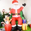 Uppblåsbara studsare Playhouse Swings stora storlek Chirstmas Toys Santa Claus sitter på soffan med björngåvor LED -lampor Årets utomhusdekoration 230803