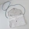 2023 Mini bolsas de teléfono brillantes bolso de diseñador mujer bandolera bandolera de lujo monederos cruzados brillante plata correa colorida 5A