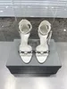 Cagole Women Sandal Luxury Designer Metal Nail Le Cagoe 기관차 파리 바람 리벳 생선 부리 로마 스타일 샌들 패션 가죽 고품질 고품질 고급 힐 샌들