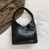 Bolsos de hombro Bolso de textura de estudiante Mujer Otoño 2023 Nueva tendencia de moda Bolso grande INS Bolso de axila de gran capacidad Mujerestilobolsos de mano