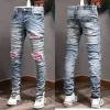 2023 Designer heren jeans hiphop mode rits gat wassen jean broek retro gescheurde vouw stiksels mannen ontwerp motorrijden cool slanke broek paars jean P1ue #