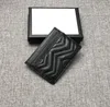 Porte-cartes de créateur en cuir véritable porte-cartes en cuir souple pour femmes porte-monnaie de haute qualité en peau de vache petit portefeuille lettre en métal designers de luxe portefeuille noir