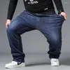 Мужские джинсы свободны джинсовые брюки плюс размер брюки для жирного бренда прямой случайный большой большой