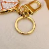 Luxurys Designer Keychain Lover Round Diamond Fashion Car Handmade Ring Classic Keychain Men Women Bag Bendant G23080413Z-6