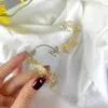 Pendientes traseros, Clips de oreja de mariposa de diamantes de imitación Vintage, brazalete de diseño hueco sin perforación para mujeres y niñas, joyería de fiesta de moda coreana