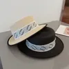 مصممي الرجال قبعات دلو لوكسوريس العلامات التجارية القش القبعة أزياء رسائل رمادية أغطية مسطحة للجنسين العصرية العصرية الصيفية sunhats