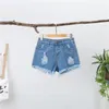 Short jeans feminino cintura alta rasgado curto