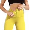 Pantaloni modellanti elastici a vita alta da donna e pantaloni fitness aderenti con bottoni in tinta unita per stringere l'addome