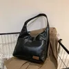 Bolsos de hombro Bolso de textura de estudiante Mujer Otoño 2023 Nueva tendencia de moda Bolso grande INS Bolso de axila de gran capacidad Mujerestilobolsos de mano