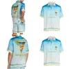 Erkekler Sıradan Gömlekler Kazablanka Tasarımcı Gömlek 23SS Mavi Tenis Mahkemesi Erkekler ve Kadın Beyaz Dimi İpek Kısa Kollu Kazablan Damlası Deli Dhfyv