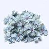 Fleurs décoratives 50pcs Mini têtes de fleurs de marguerite en soie artificielle pour le mariage décoration de la maison travail manuel bricolage guirlande accessoires faux