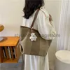 Lona de gran capacidad para las mujeres Otoño Primavera 2023 Nueva moda Commuter Shoulder Tote Simple y de moda Tidestylishhandbagsstore