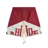 Shorts Masculino Rhude Gráfico Mens Basketball Short Designers Últimas Calças Limitadas Luxos Verão Praia Palm Letra Malha Moda Rua Dhgga