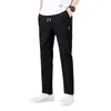Мужские брюки 2023 Случайные мужчины, сшивая корейскую версию большой модной тенденции световой бизнес, прямые спортивные штаны