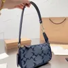 Luxurys Mujeres clásico teri hombro bolsa de viaje Diseñador para hombre vacaciones de verano bolsos de embrague señora Tarde cremallera totes bolso 7A calidad lona cruzada cuerpo satchel bolsas