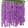 装飾的な花12pcs wisteria人工花レイタンフェイクリースアーチウェディングホームガーデン装飾ペンダント植物壁の装飾