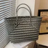 Shoulder Bags This year's popular color contrast niche straw woven bags for women 2023 new summer portable cabbage basket bucket bagsstylishhandbagsstore