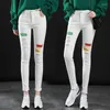 Kvinnors jeans vita casual slim-fit byxor trasiga hål 2023 våren hög midja tät penna